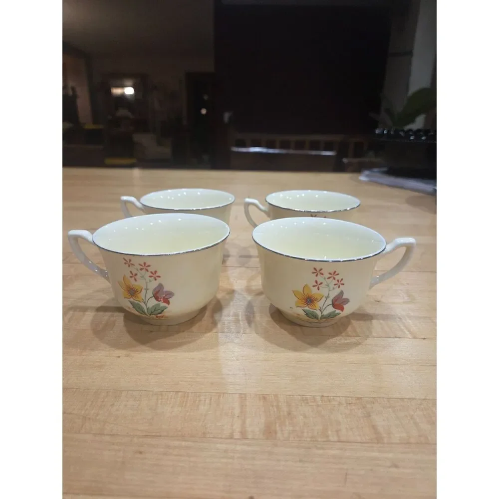 Set of 4 Vintage Porcelain Floral Teacups Yellow Purple Flowers Silver Rim